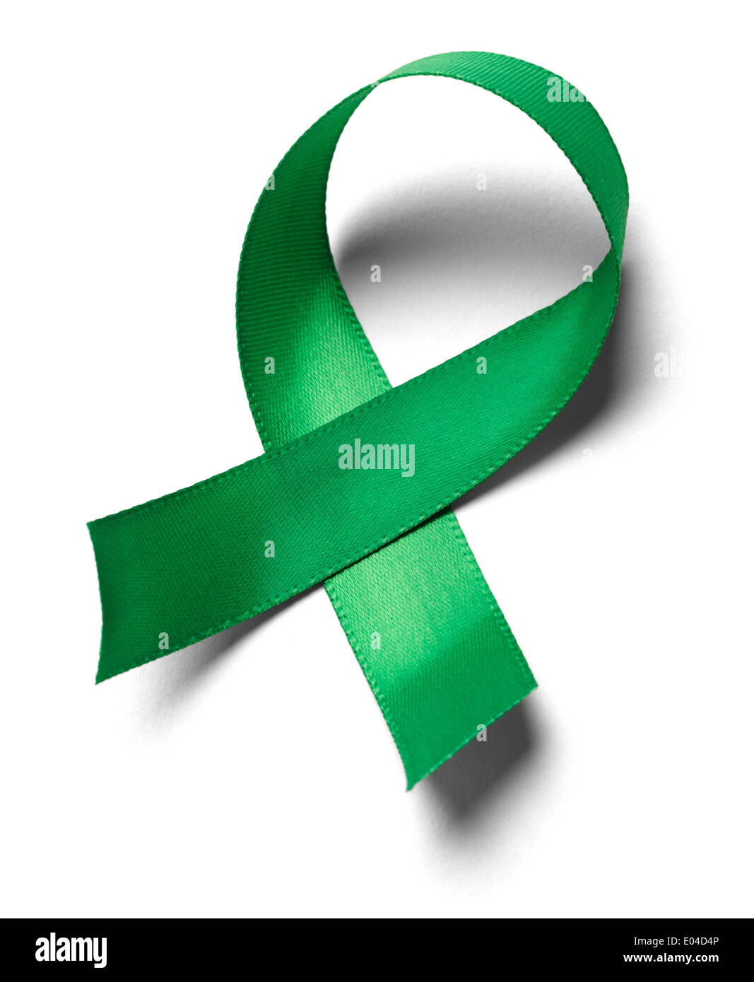 Green awareness ribbon isolated on a white background. Stock Photo