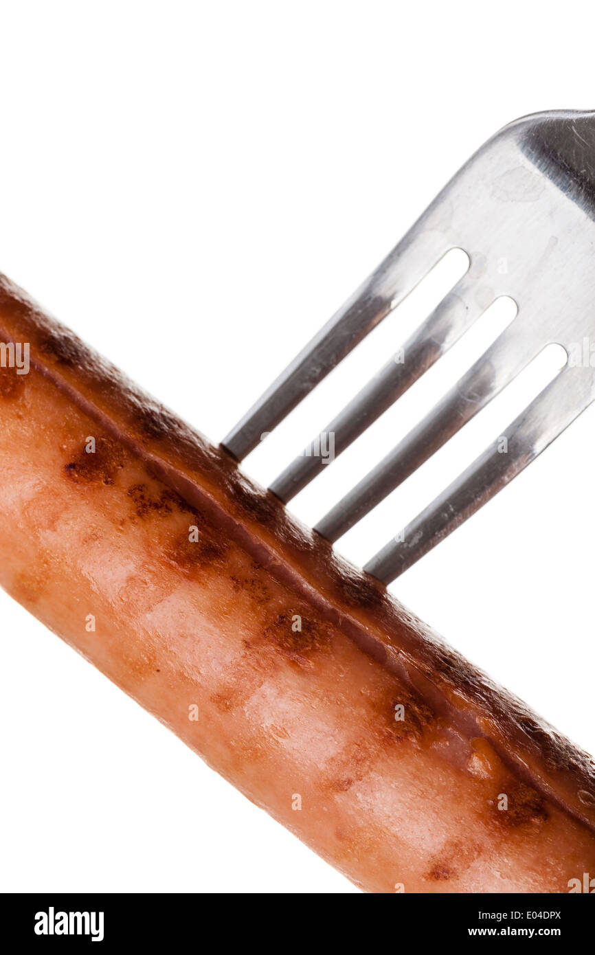 a delicious sausage on a fork over white Stock Photo