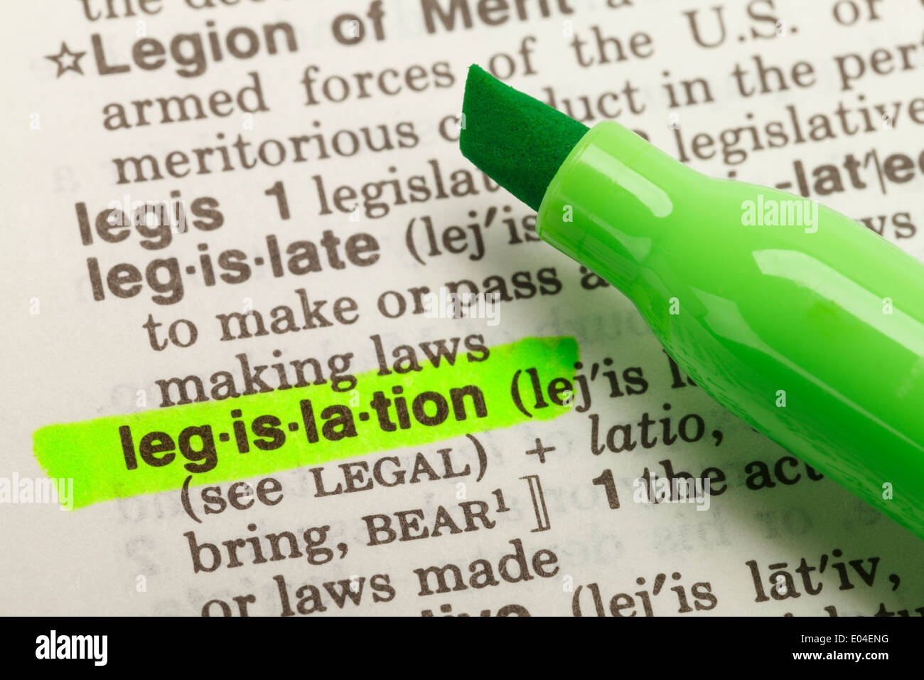 The Word Legislation Highlighted in Dictionary with Yellow Marker Highlighter Pen. Stock Photo