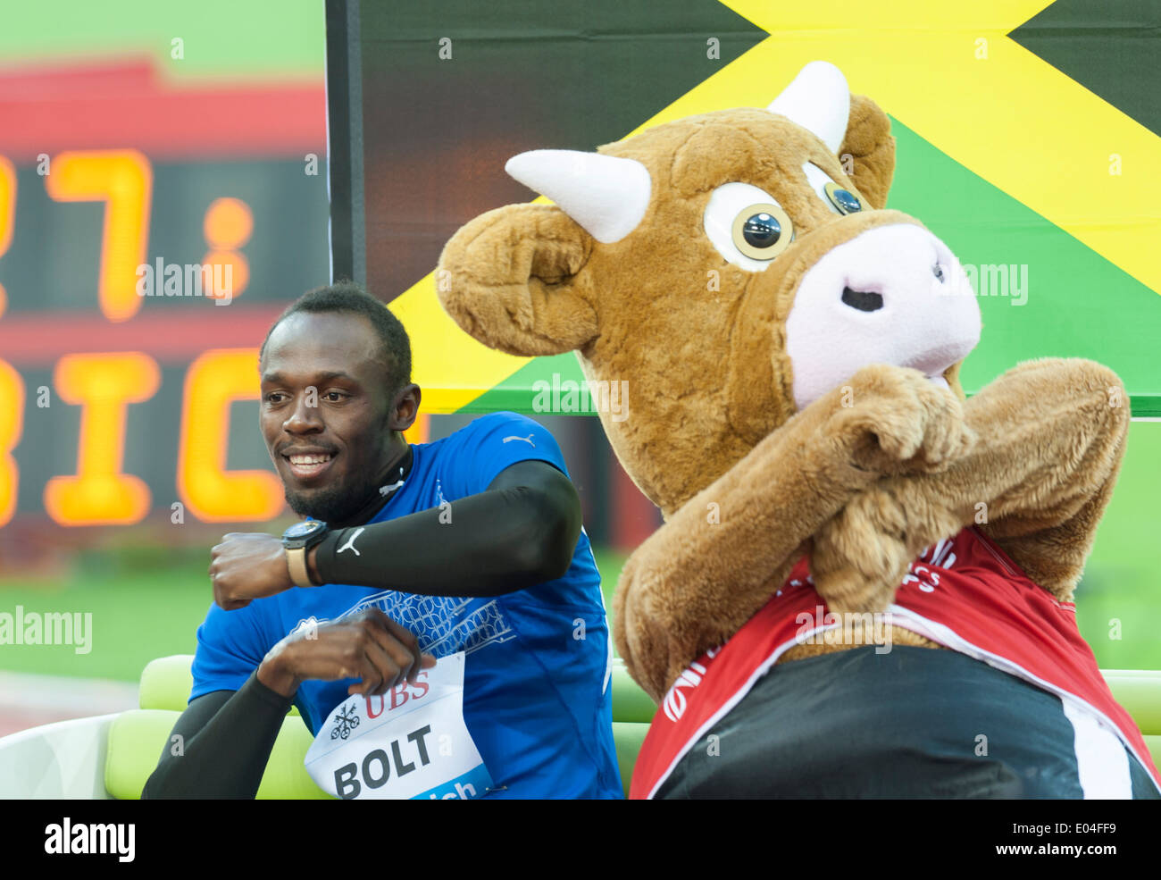 Usain Bolt (JAM) with mascot "Cooly" during the athletes' presentation at Zurich's Letzigrund stadium. Stock Photo