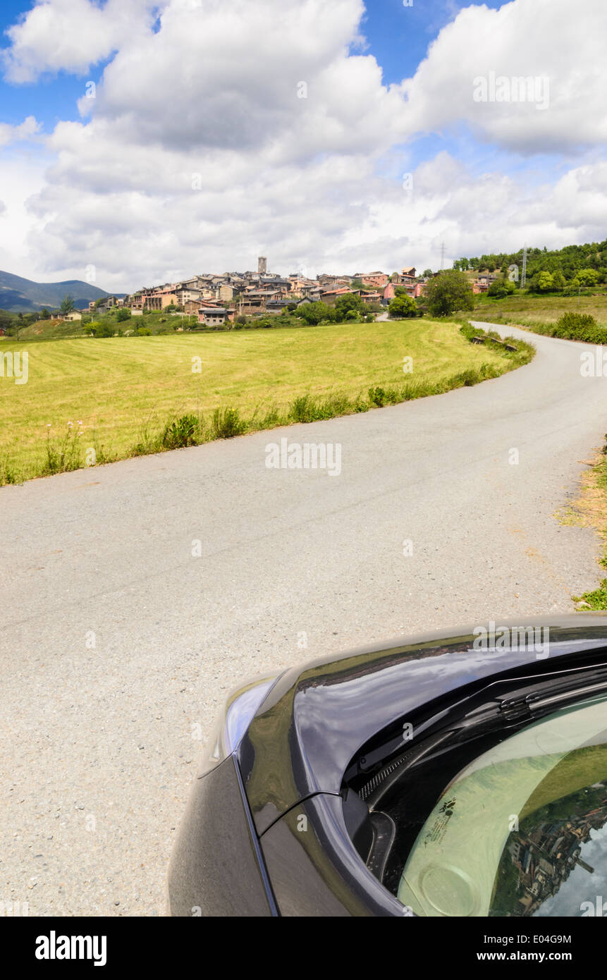 Front of a car entering a winding road to the village of El Pla de Sant Tirs, Ribera d'Urgellet, Alt Urgell, Catalonia, Spain Stock Photo