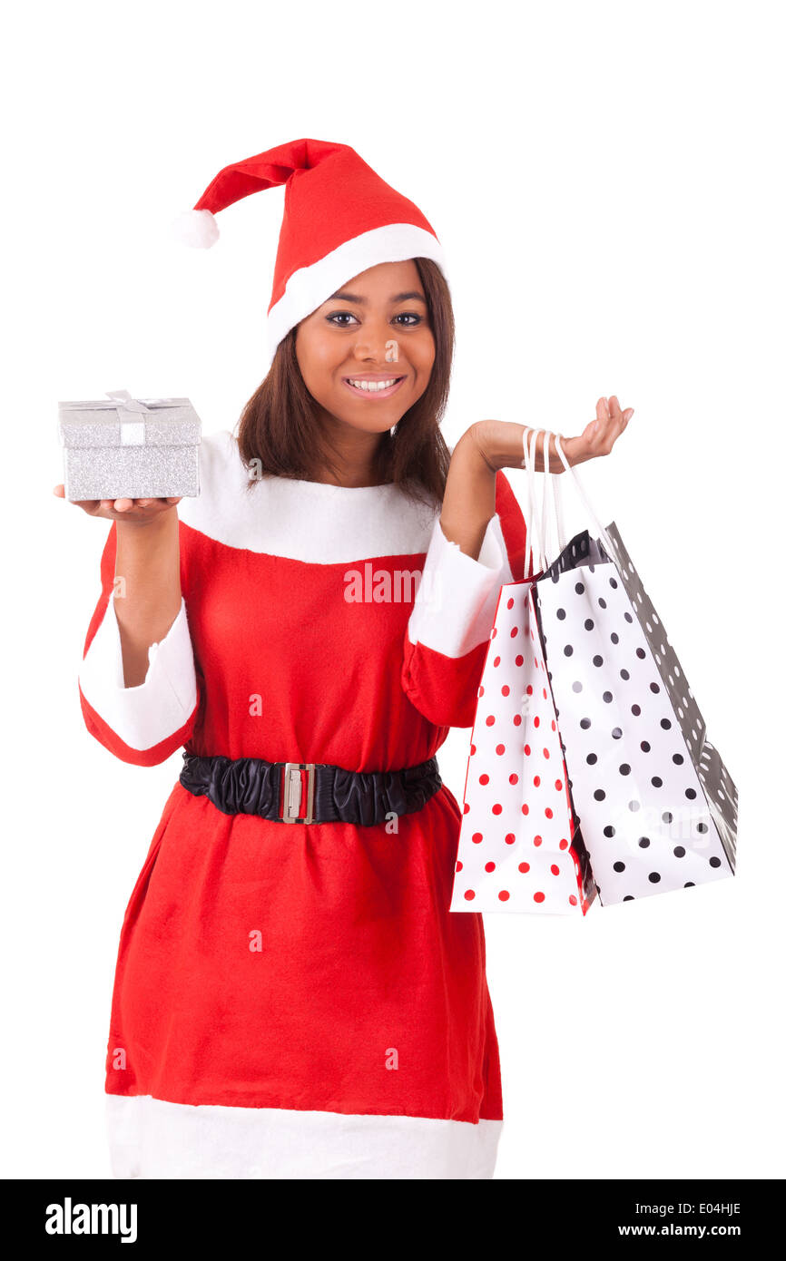 Young African American woman wearing a santa hat Stock Photo