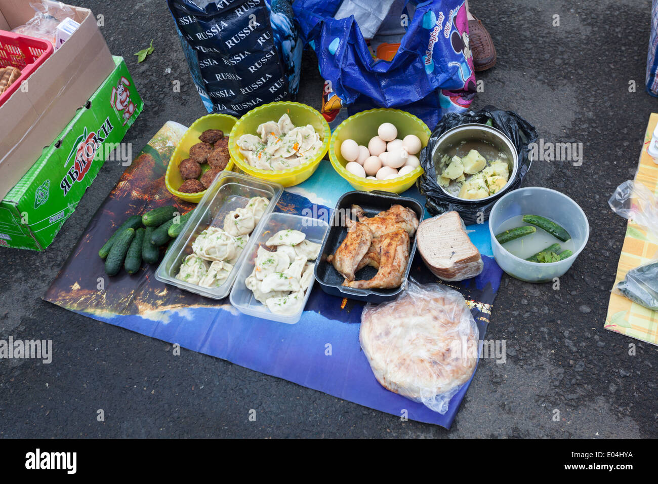Food stall on the platform of one of the railway stations on the route of Trans-Siberian Railway,  Russia Stock Photo