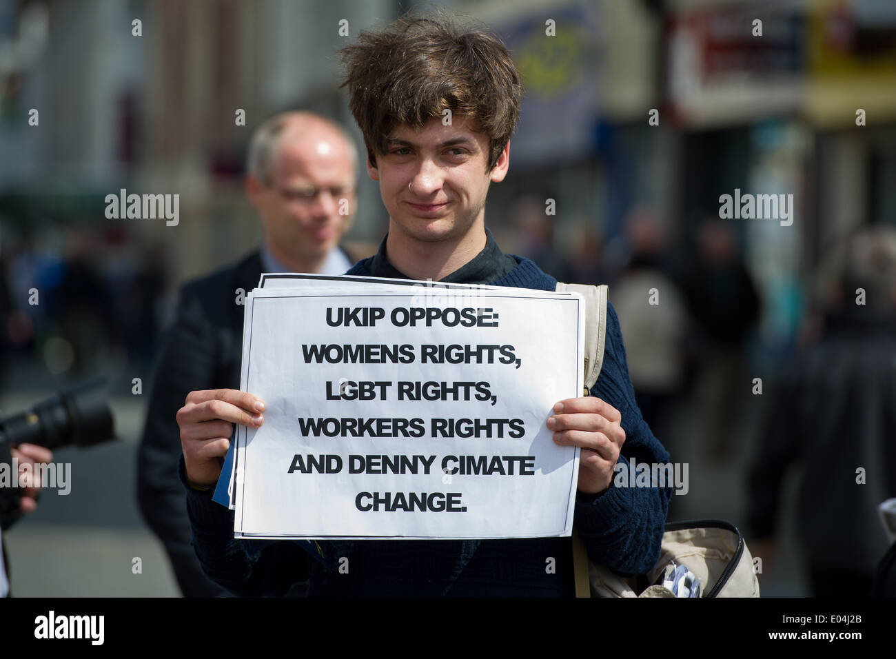 A young man protesting against UKIP policies in Swansea, UK, on the day of a UKIP supporters rally. Stock Photo