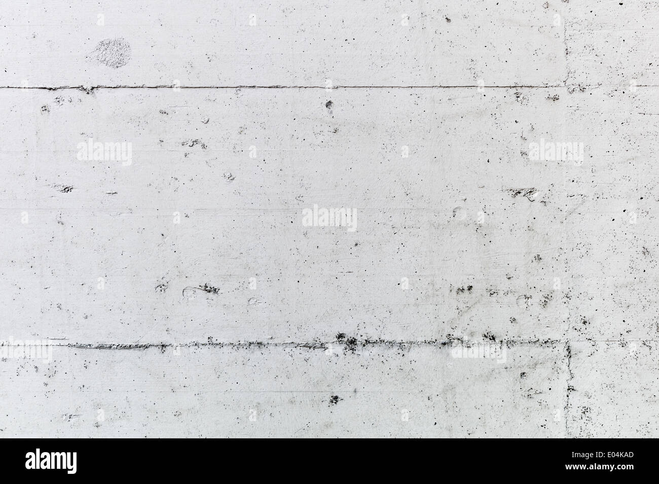 A concrete flow ace a background with text clearance., Eine Betonmauer als Hintergrund mit Textfreiraum. Stock Photo