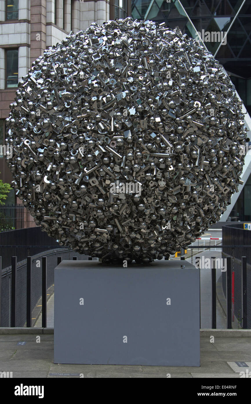 Round sculptural piece made up of nuts, bolts and screws on display
