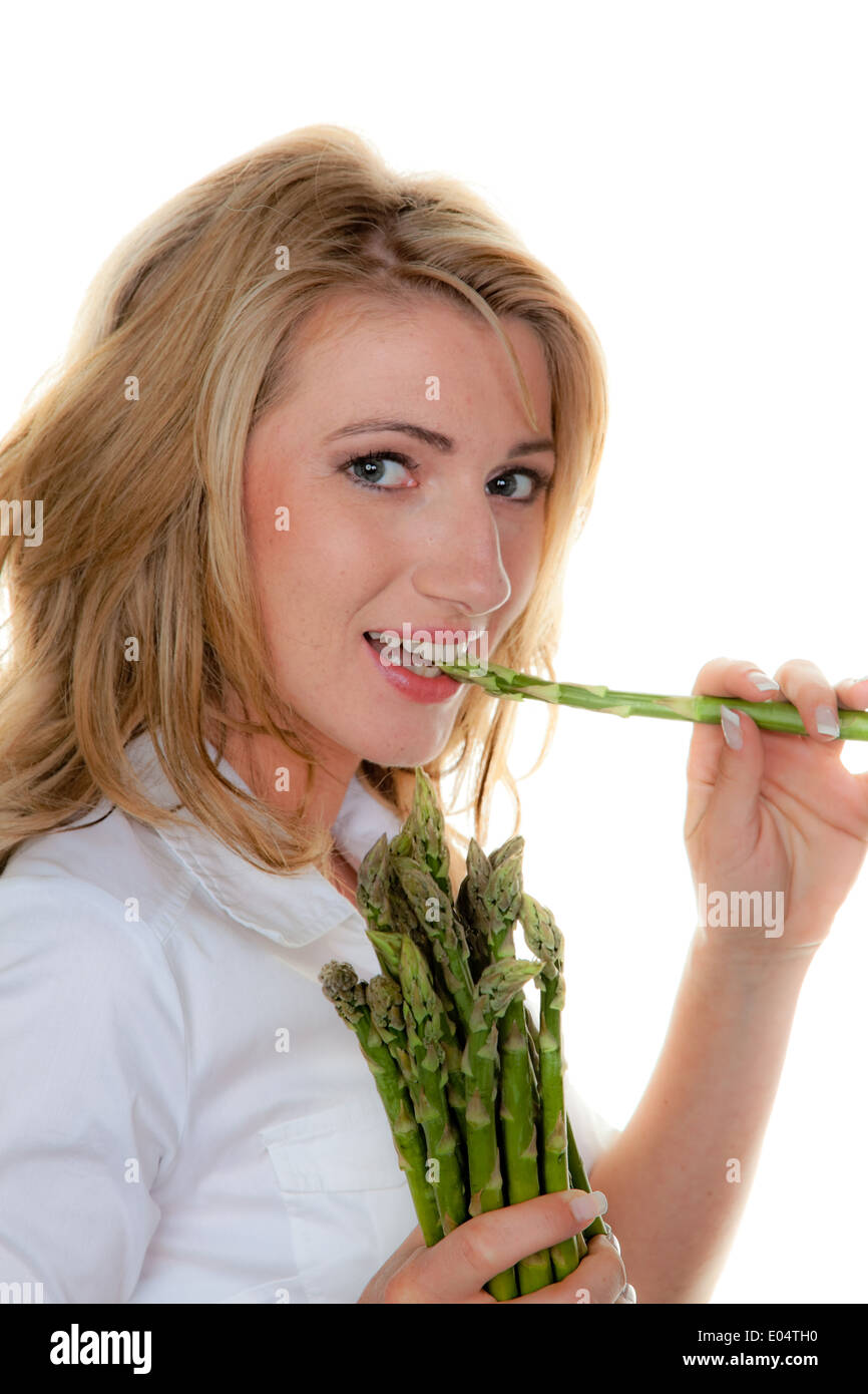 Woman with green asparagus, Frau mit gruenem Spargel Stock Photo