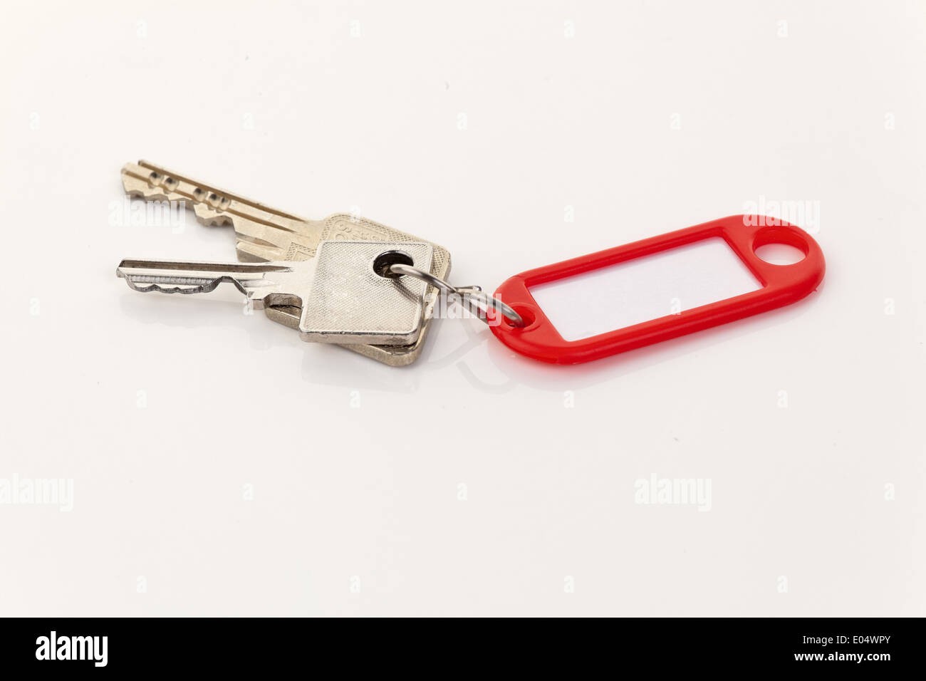 Keys lie on a white background, Schluessel liegen auf einem weissen Hintergrund Stock Photo