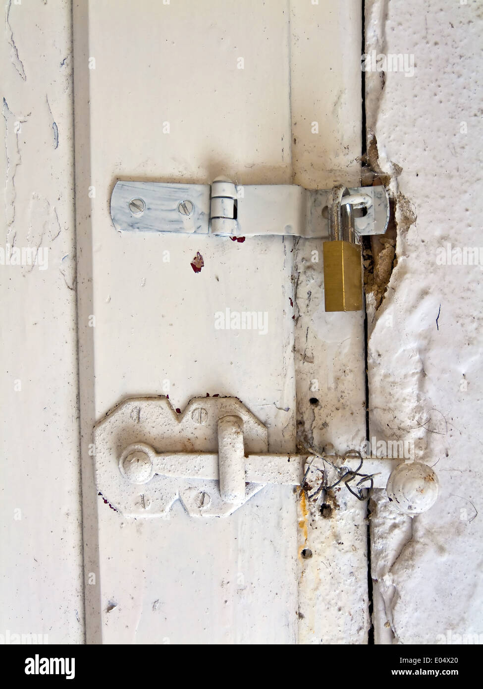 Old hinge of a T?re of a dwelling house, Altes Scharnier einer Tuere eines Wohnhauses Stock Photo