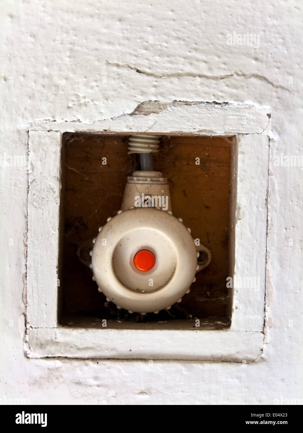 Old light switch for lighting in a house, Alter Lichtschalter fuer Beleuchtung in einem Haus Stock Photo