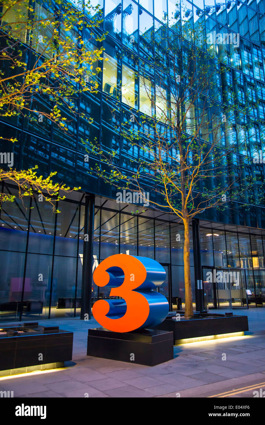 Brightly painted huge number 3 in front of the Willis building, City of London, England, UK Stock Photo