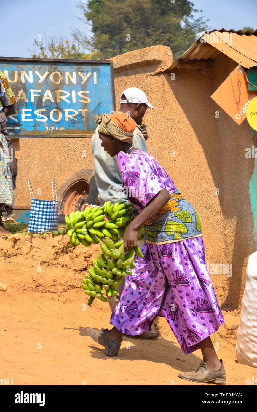 woman with bananas at marketplace at crater lake bunyonyi in uganda, africa Stock Photo