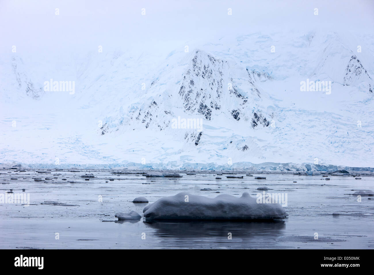 snow covered Anvers Island and Fournier Bay Antarctica Stock Photo