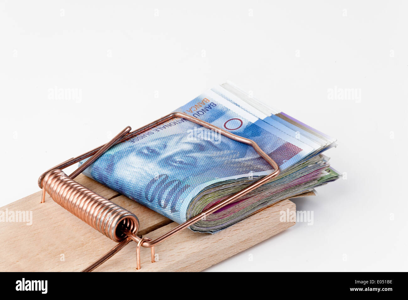 Many Swiss francs of bank notes in mousetrap, Viele Schweizer Franken  Geldscheine in Mausefalle Stock Photo - Alamy