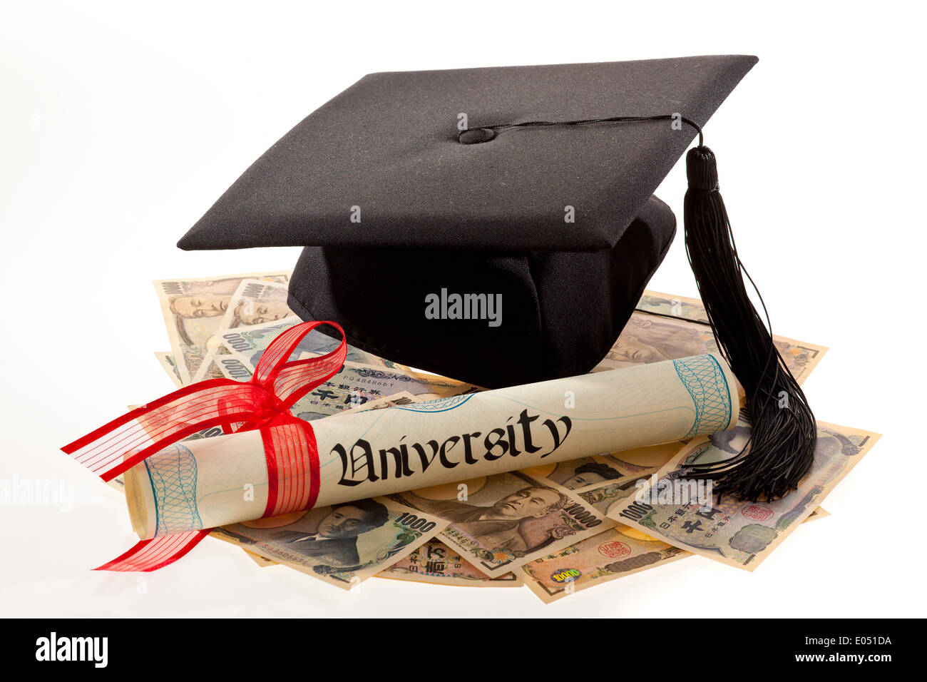 Doctoral cap and yen. Symbolic photo for educational costs in Japan Stock Photo