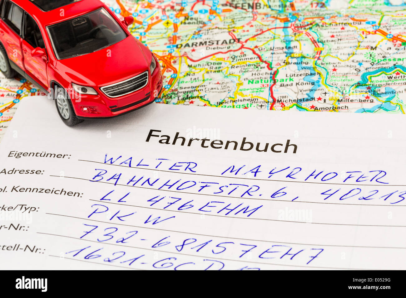 Logbook for a car. For commuter-all-inclusive and tax office., Fahrtenbuch fuer ein Auto. Fuer Pendlerpauschale und Finanzamt. Stock Photo