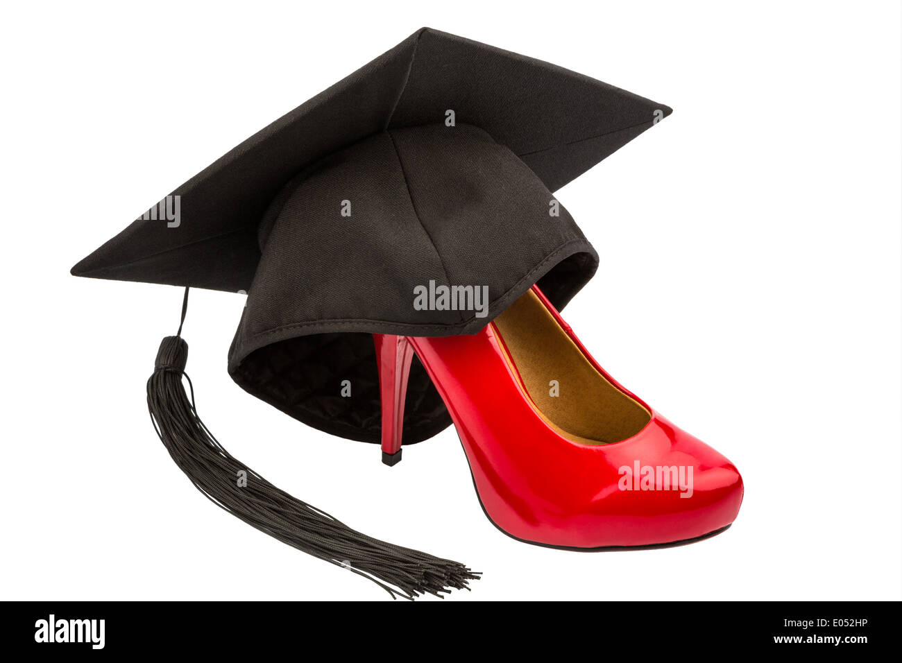 A red ladies' shoe on a doctoral cap, symbolic photo for equal rights and women's power Stock Photo