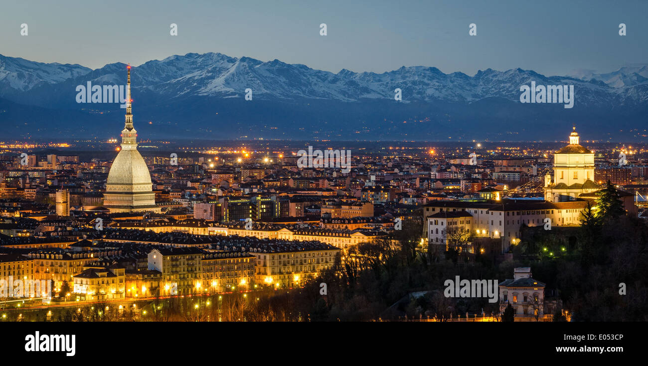 Turin (Torino), night panorama with Mole Antonelliana and Alps Stock Photo