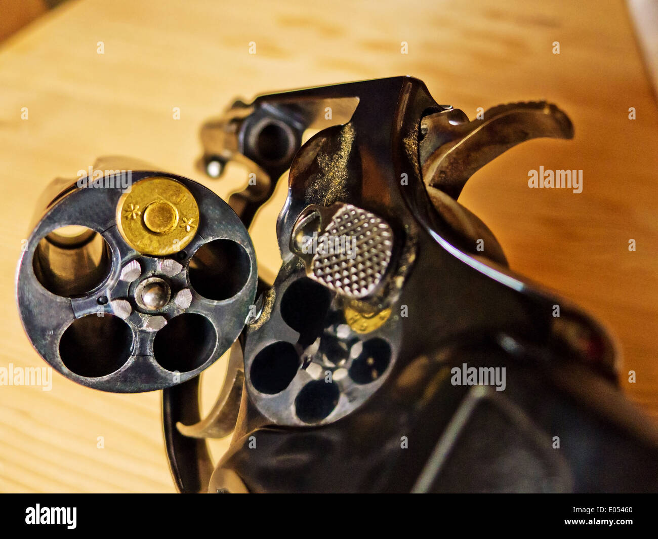 A revolver with one single cartridge. Symbolic photo for Russian roulette., Ein Revolver mit einer einzigen Patrone. Symbolfoto Stock Photo