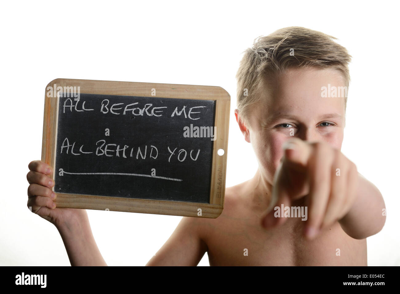 Stock photo of a yong teenager holding a sign saying all before me all ...