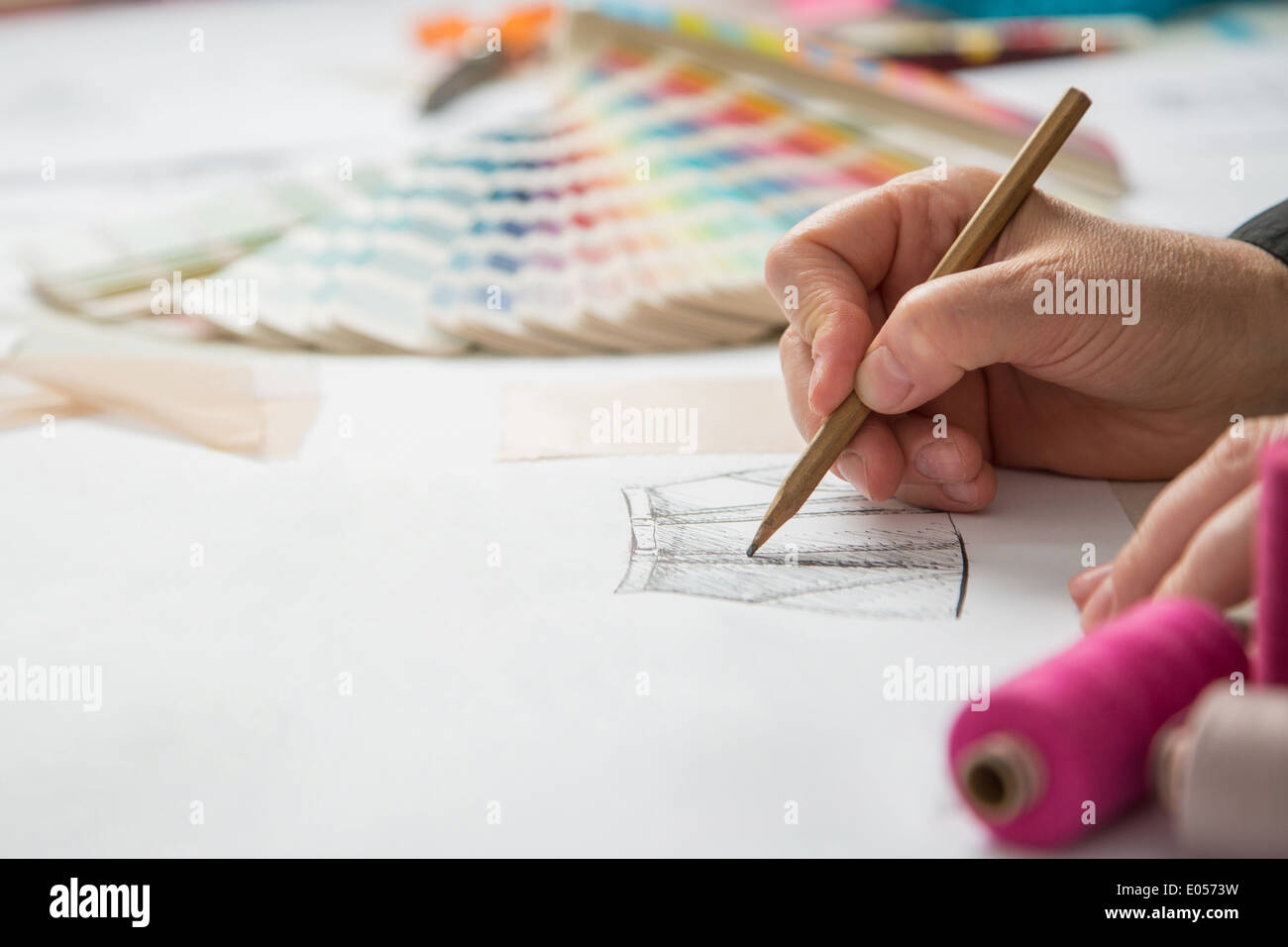 fashion designers, working in progress on tailor table Stock Photo