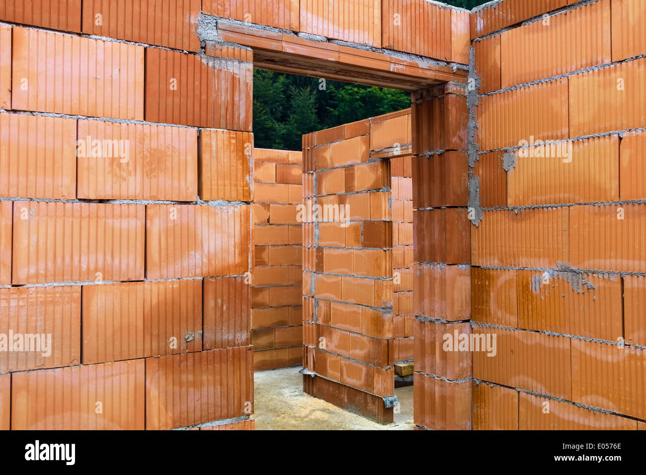 The shell of a single-family dwelling in brick massive construction. Building site for building of a house., Der Rohbau eines Ei Stock Photo
