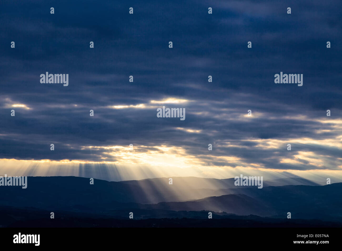 Sunrays in the cloud sky in the evening. Symbolic photo for resurrection, strength, rest and peace., Sonnenstrahlen im Wolkenhim Stock Photo