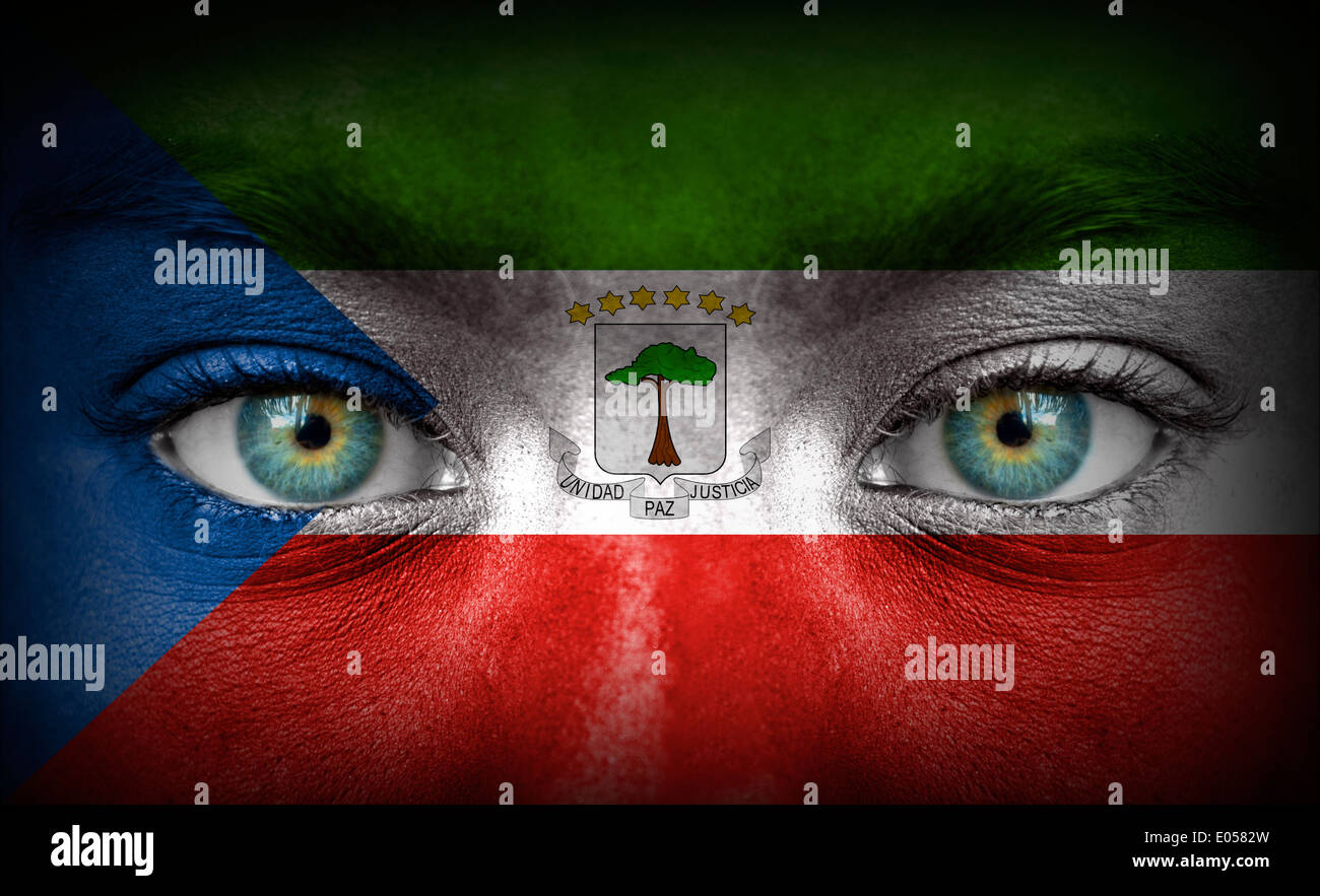 Human face painted with flag of Equatorial Guinea Stock Photo