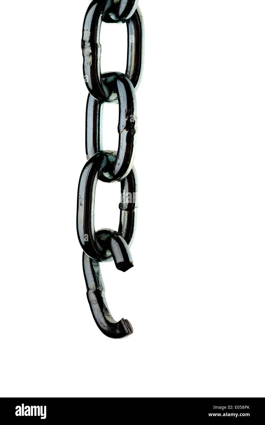 Defective steel chain before white background. Weak limb in a chain, Defekte Stahlkette vor weissem Hintergrund. Schwaches Glied Stock Photo