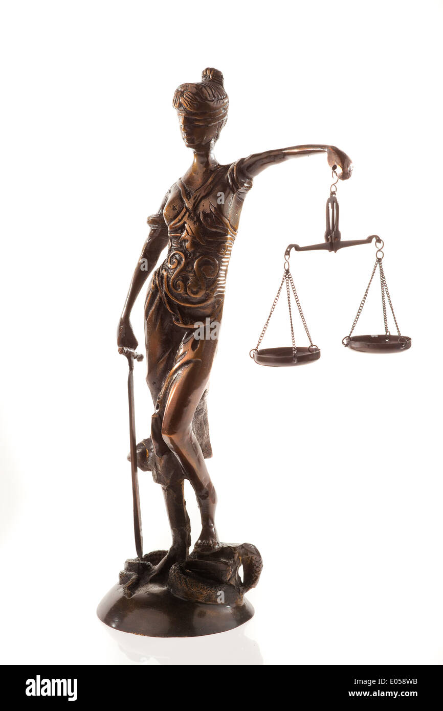 Justice with scales. Symbol for justice. Isolated before white background, Justitia mit Waage. Symbol fuer Gerechtigkeit. Isolie Stock Photo