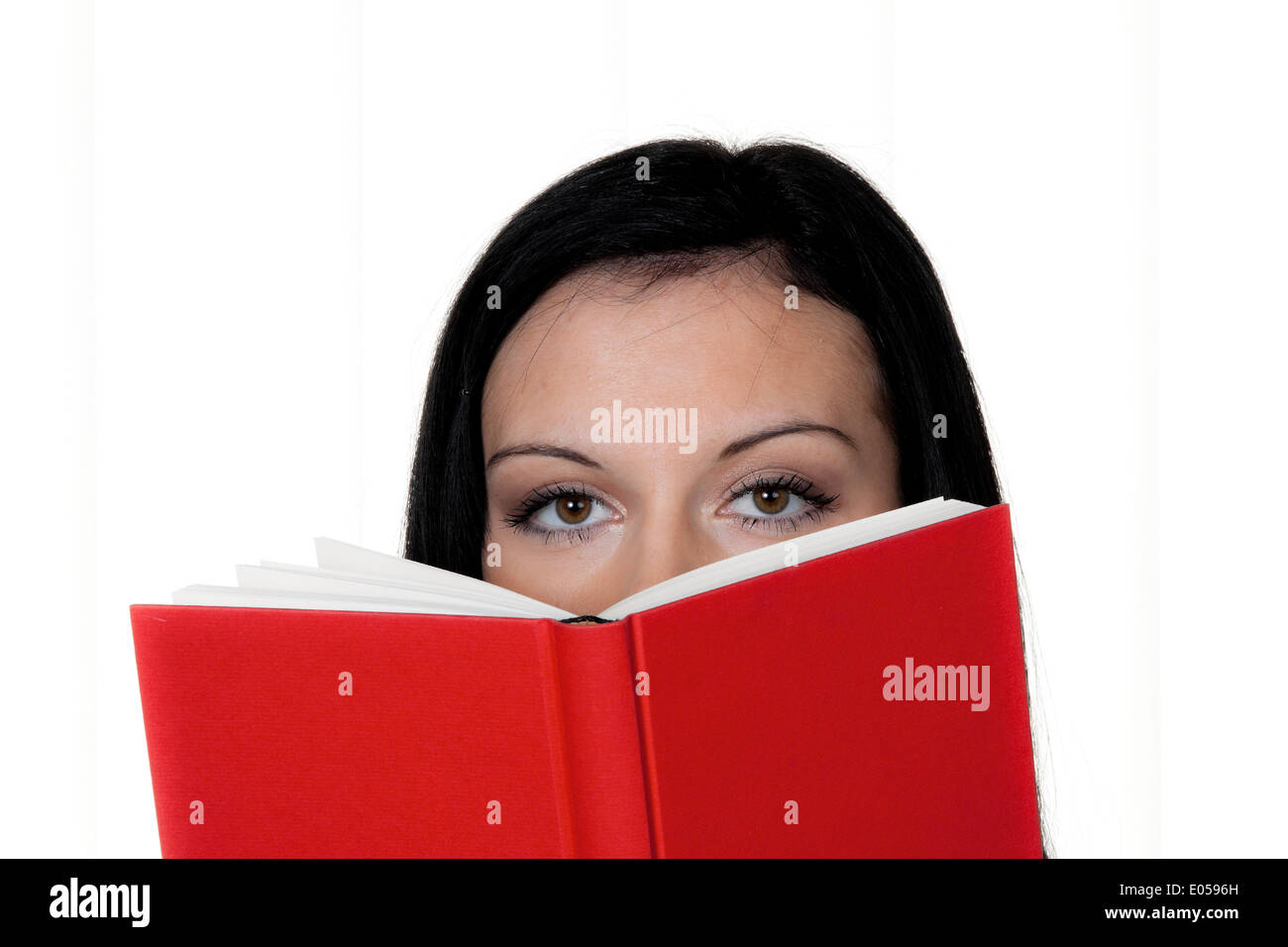 Woman with book while reading, Frau mit Buch beim Lesen Stock Photo