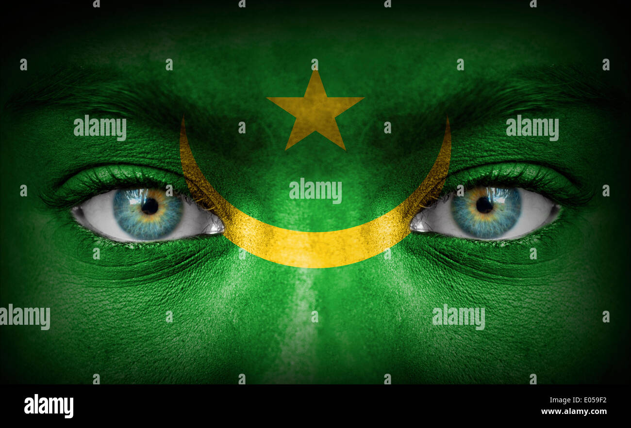 Human face painted with flag of Mauritania Stock Photo