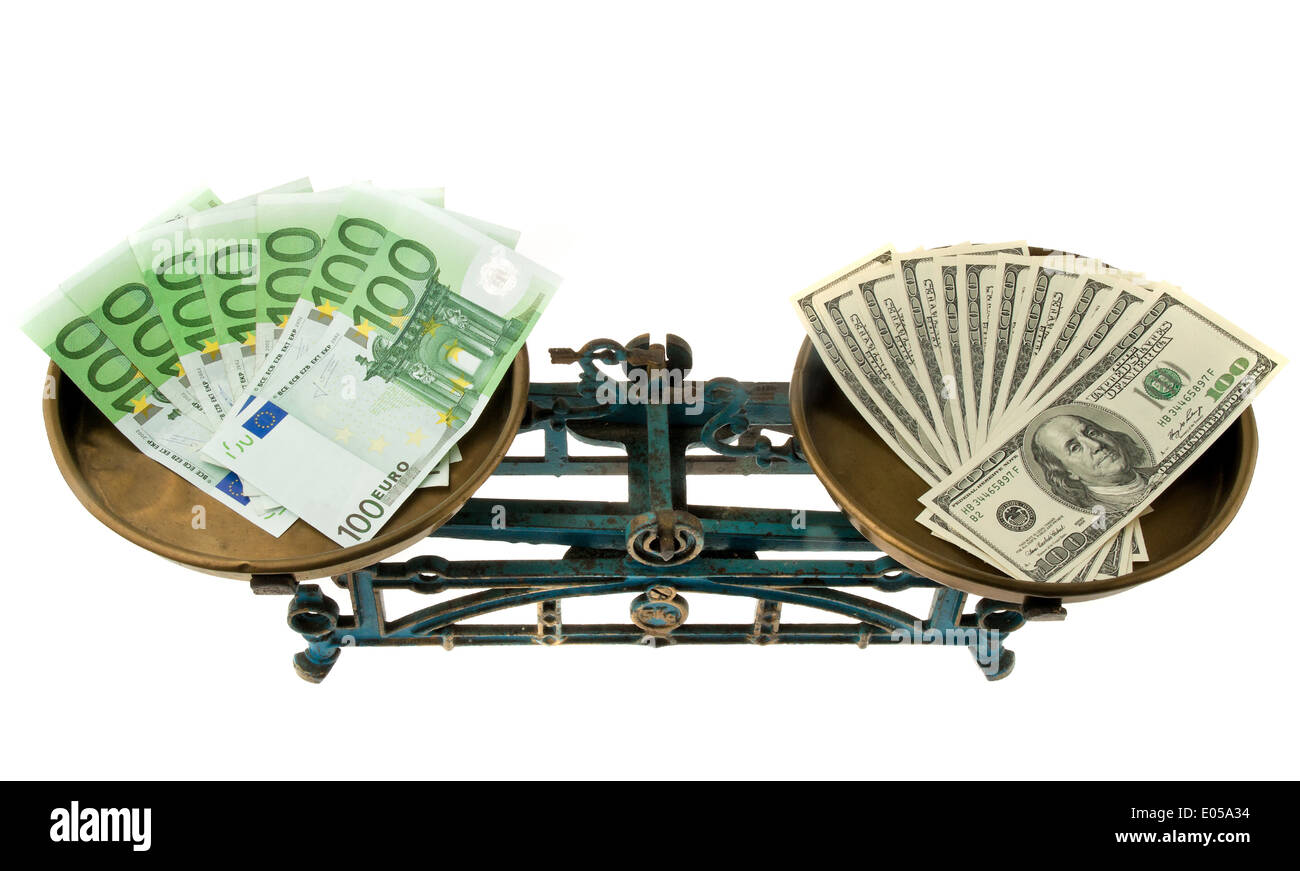 Dollar and euro on scales. Differences of the currencies, Dollar und Euro auf Waage. Unterschiede der Waehrungen Stock Photo