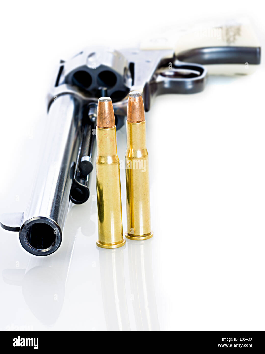Bullets and Pistol Barrel on white Stock Photo