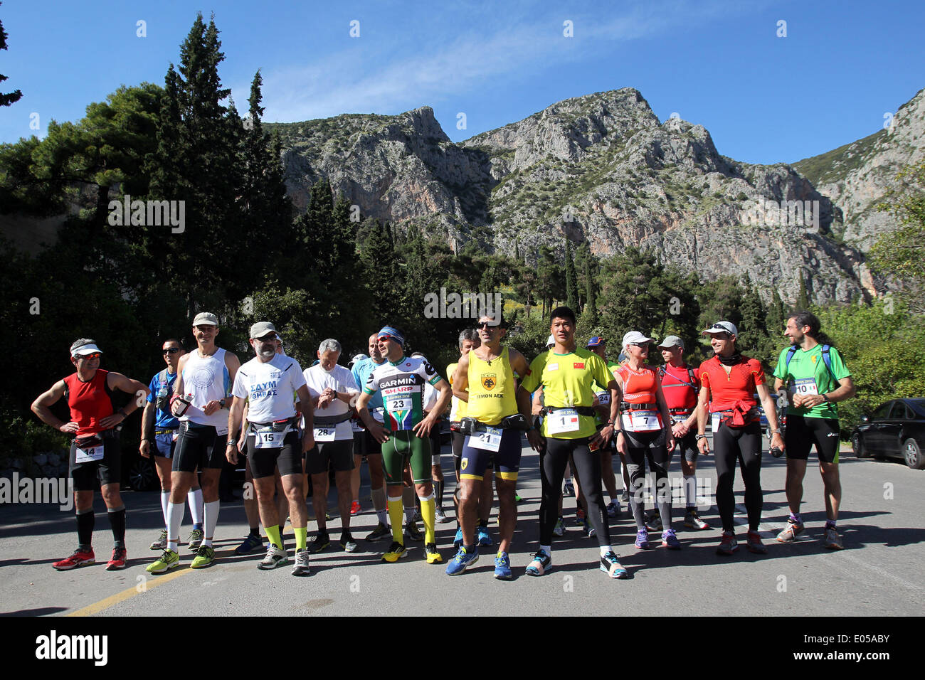 Athens. 2nd May, 2014. Participants in the 3rd Dolichos Ultra Marathon race pose for photograph at the starting point in front of the archaeological site of Delphi in central Greece on May 2, 2014. A total of 26 athletes, among them a Chinese, aim to run nonstop to Sunday afternoon the 255 kilometers course to Olympia, the birthplace of the Olympic Games. © Marios Lolos/Xinhua/Alamy Live News Stock Photo