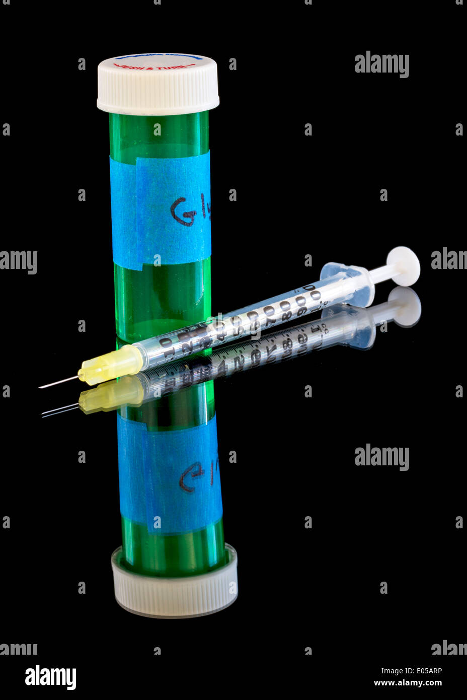 hypodermic needle and jar of medicine ready to inject Stock Photo