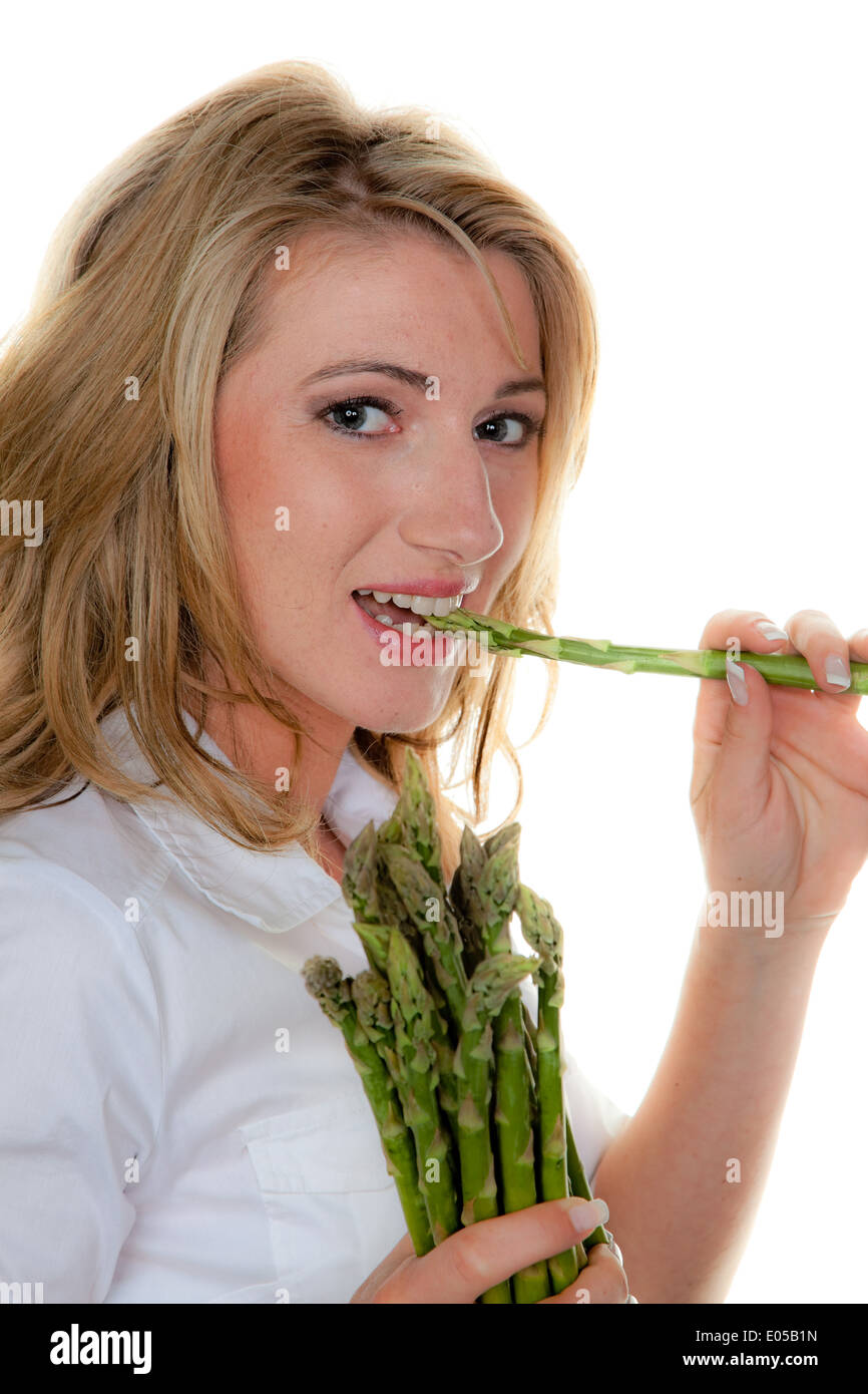 Woman with green asparagus, Frau mit gruenem Spargel Stock Photo