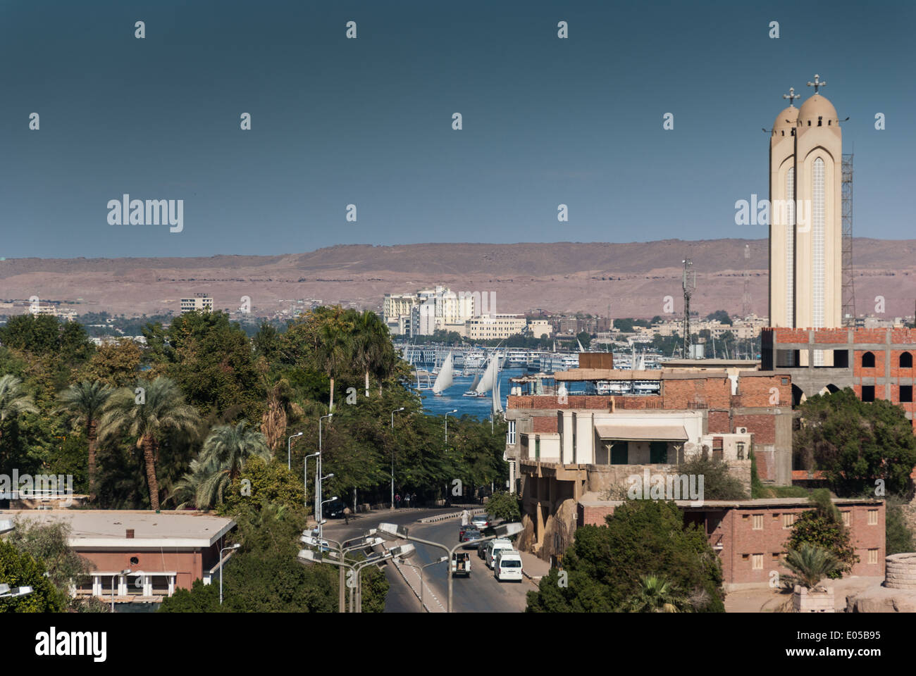 View to Aswan, Nile, and Coptic Cathedral, Aswan, Upper Egypt Stock Photo