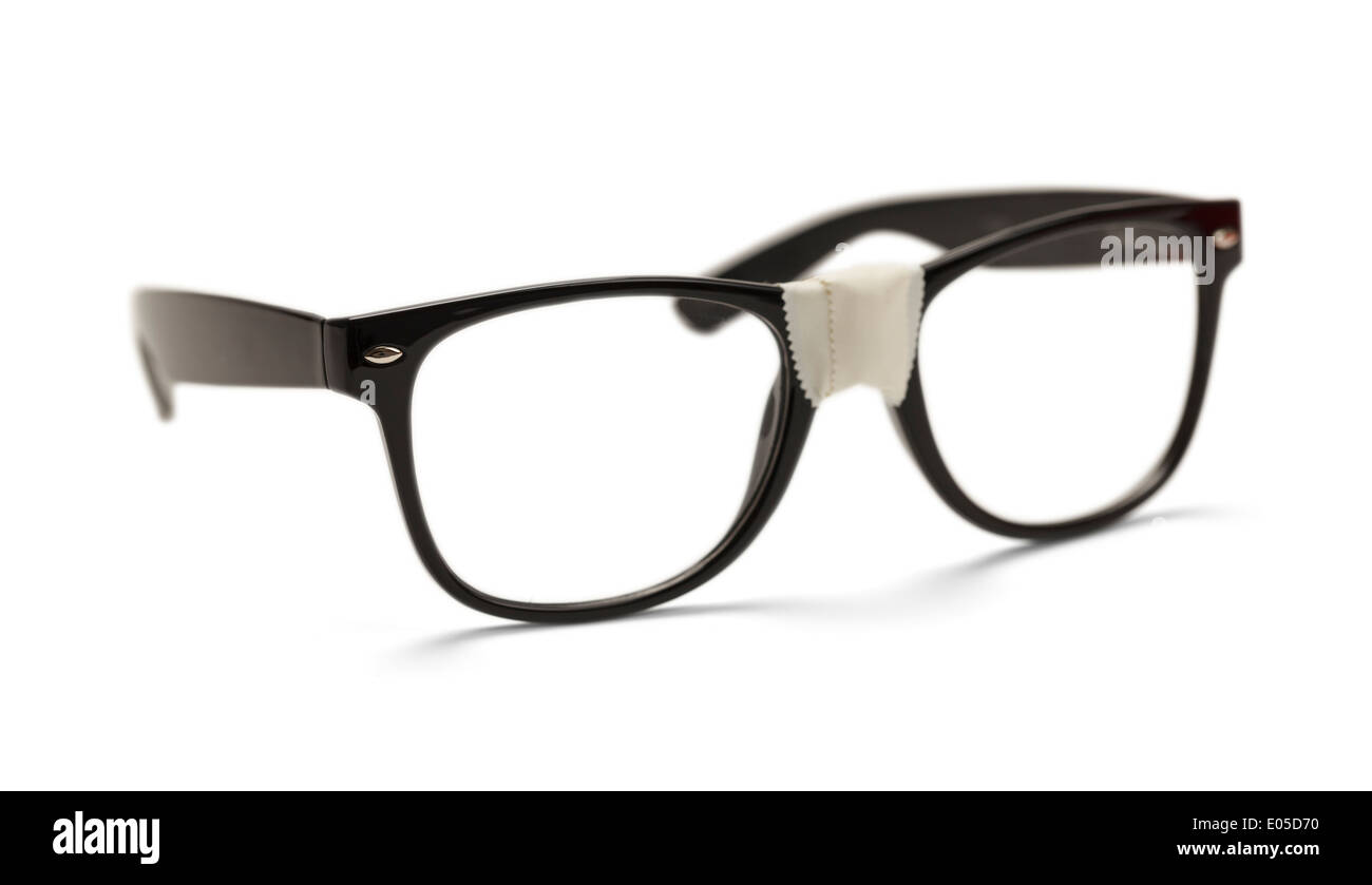 Black Plastic Eye Glasses with White Tape, Isolated on White Background. Stock Photo