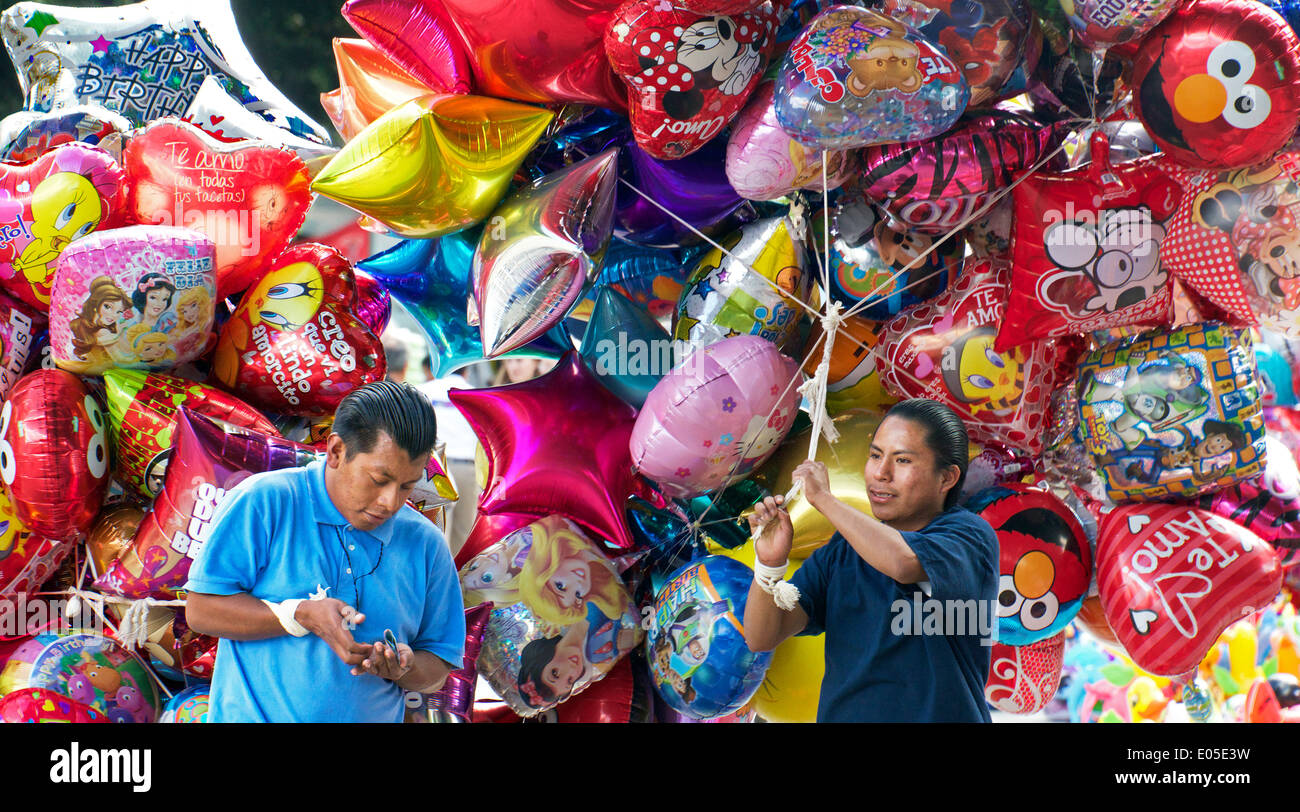 Two balloon sellers Zocalo Oaxaca City Mexico Stock Photo