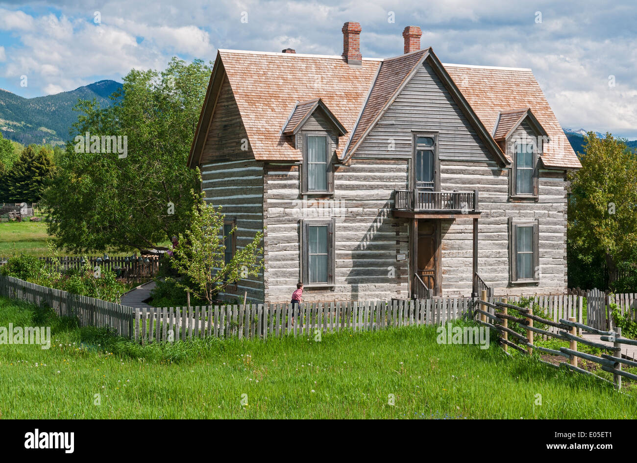 Montana, Bozeman, Museum of the Rockies, Living History Farm, original 1890s homestead house, young boy costumed interpreter Stock Photo