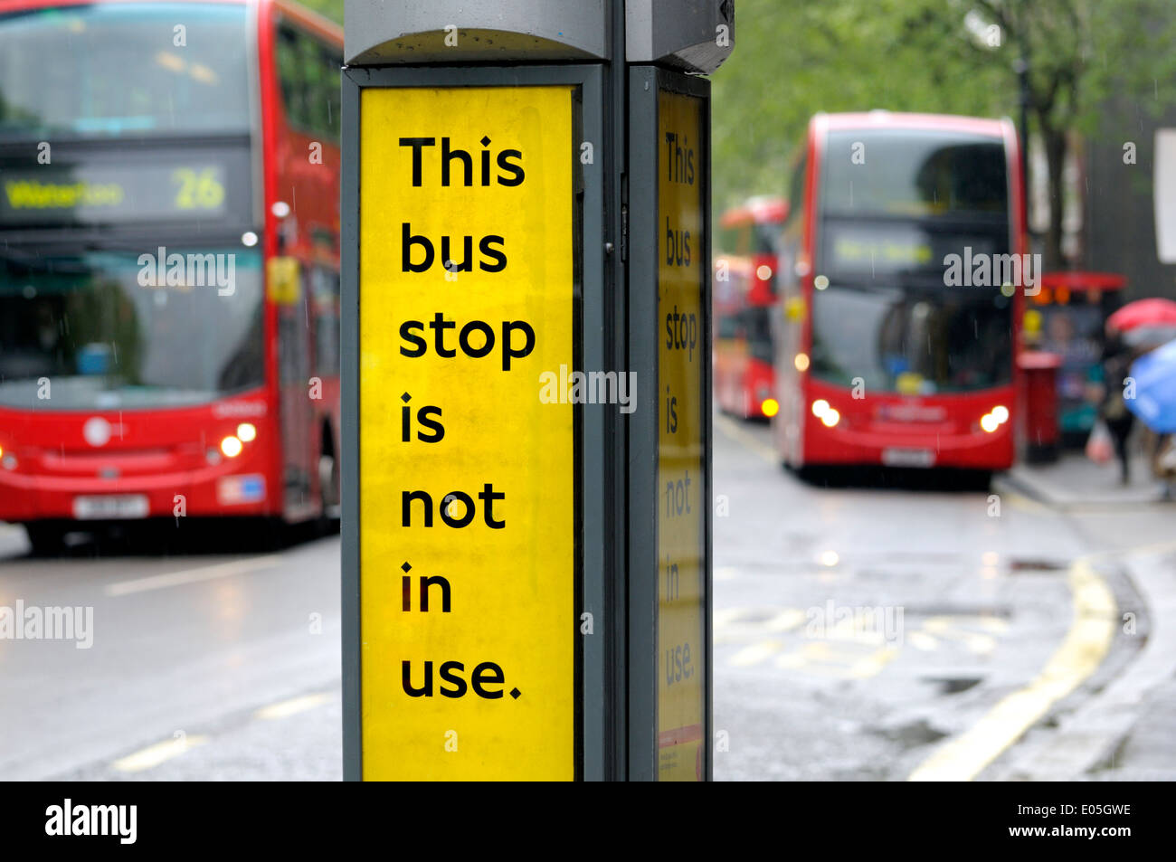 London, England, UK. Closed bus stop with buses passing Stock Photo Alamy