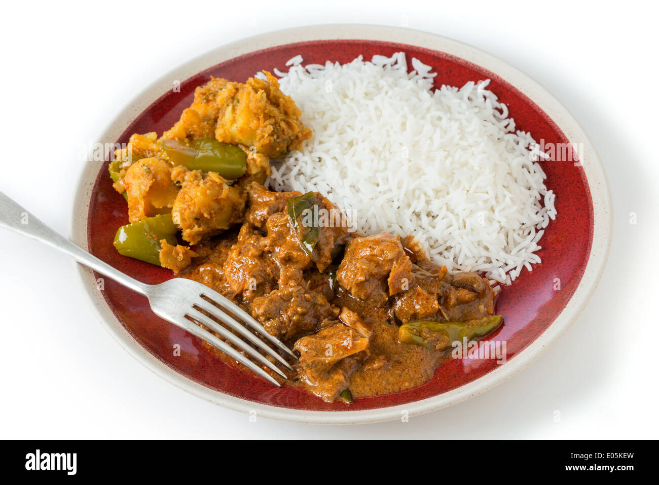 Chettinadu traditional Indian chicken bonein curry, served with white