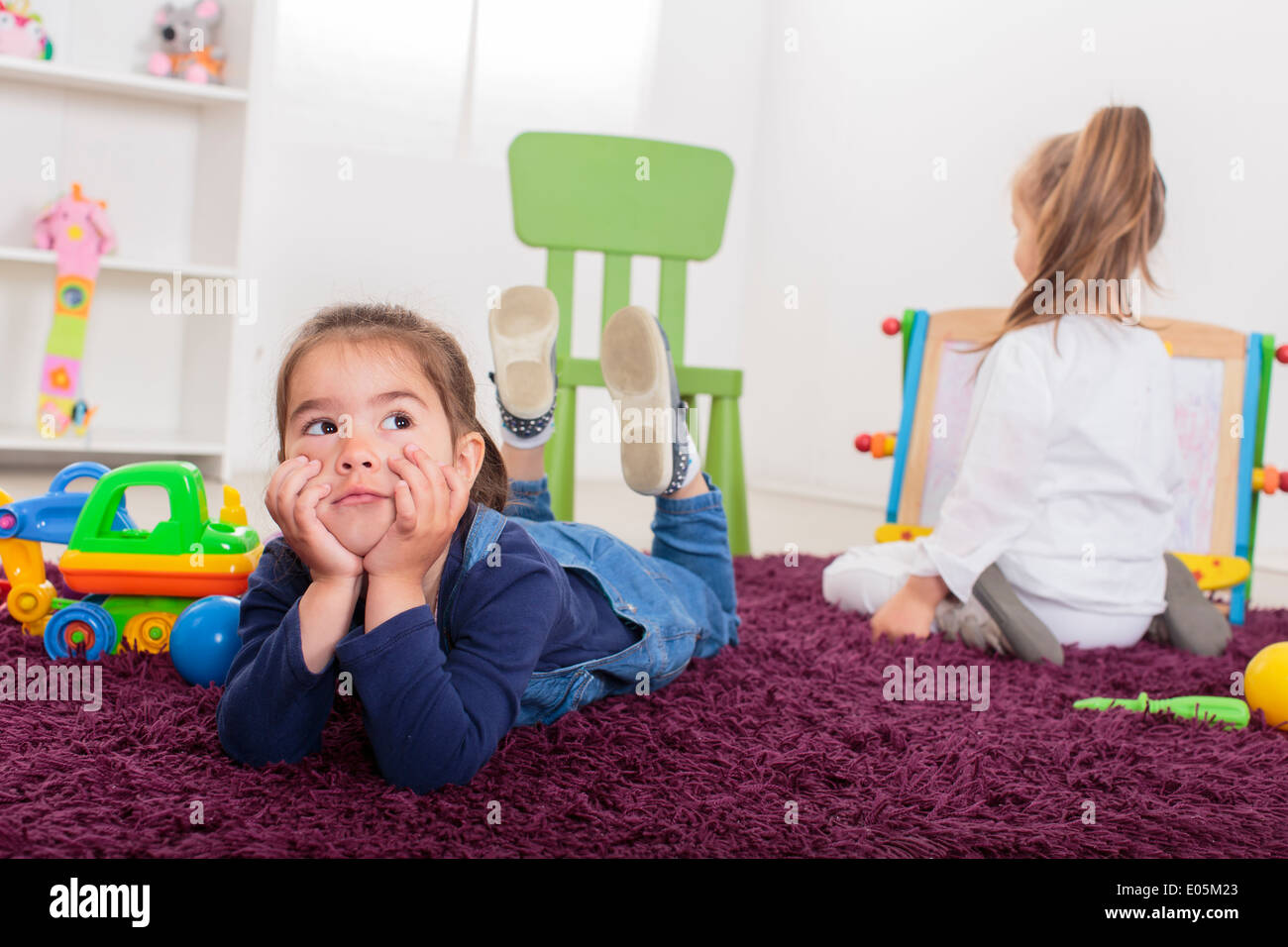 Little girls in the room Stock Photo Alamy