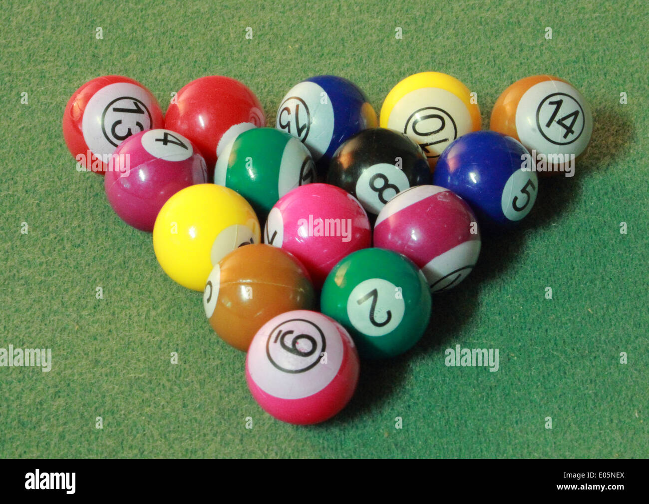 Pool balls on green cloth triangle Stock Photo Alamy