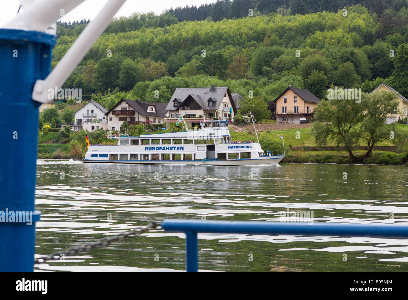 Sightseeing boat on the Mosel passing Zell Merl Stock Photo