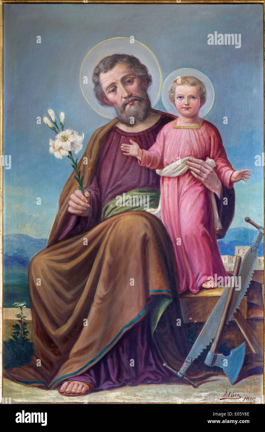 ROZNAVA, SLOVAKIA - APRIL 19, 2014: Paint of St.Joseph from 19. cent. in the cathedral by 'Adum' (1907) Stock Photo