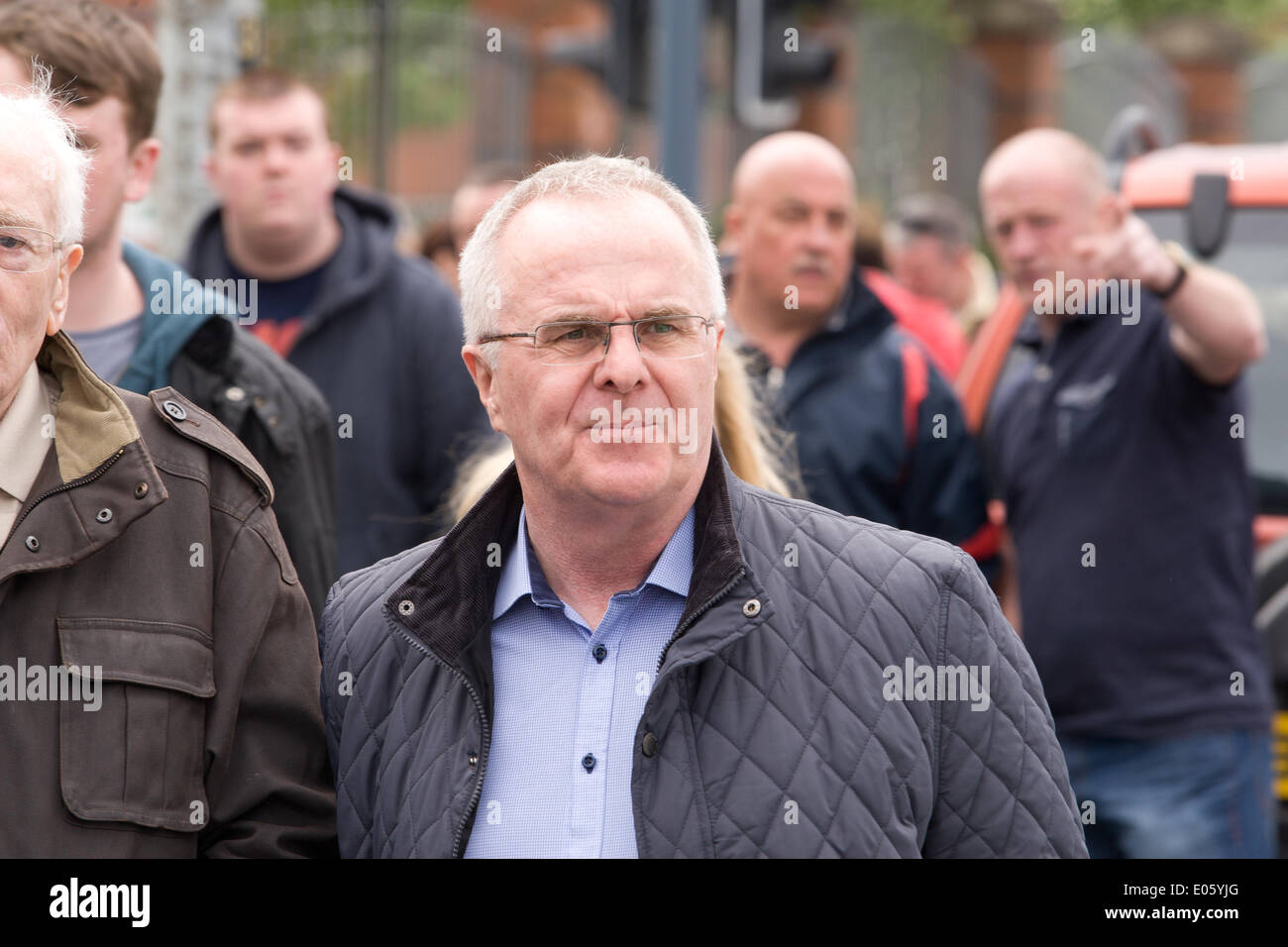 Divis Street, Belfast, Northern Ireland, UK. 3rd May 2014. Raymond McCartney at the new mural on Divis Street, Belfast, against the continuing detention of Mr Adams Credit:  Bonzo/Alamy Live News Stock Photo