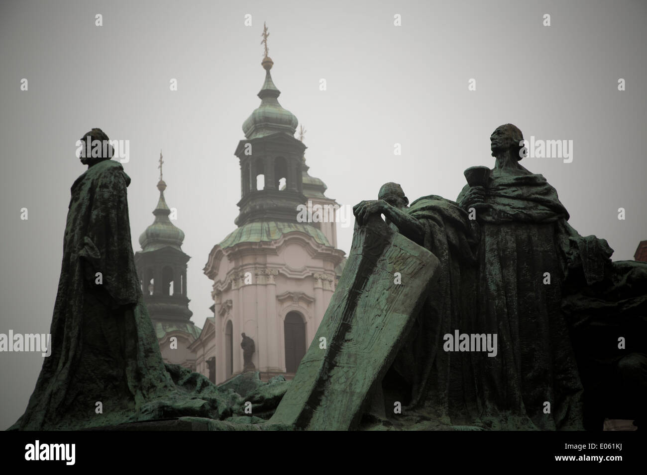 Church of St Nicholas and the Jan Hus statue at Old Town Square - Prague, Czech Republic Stock Photo