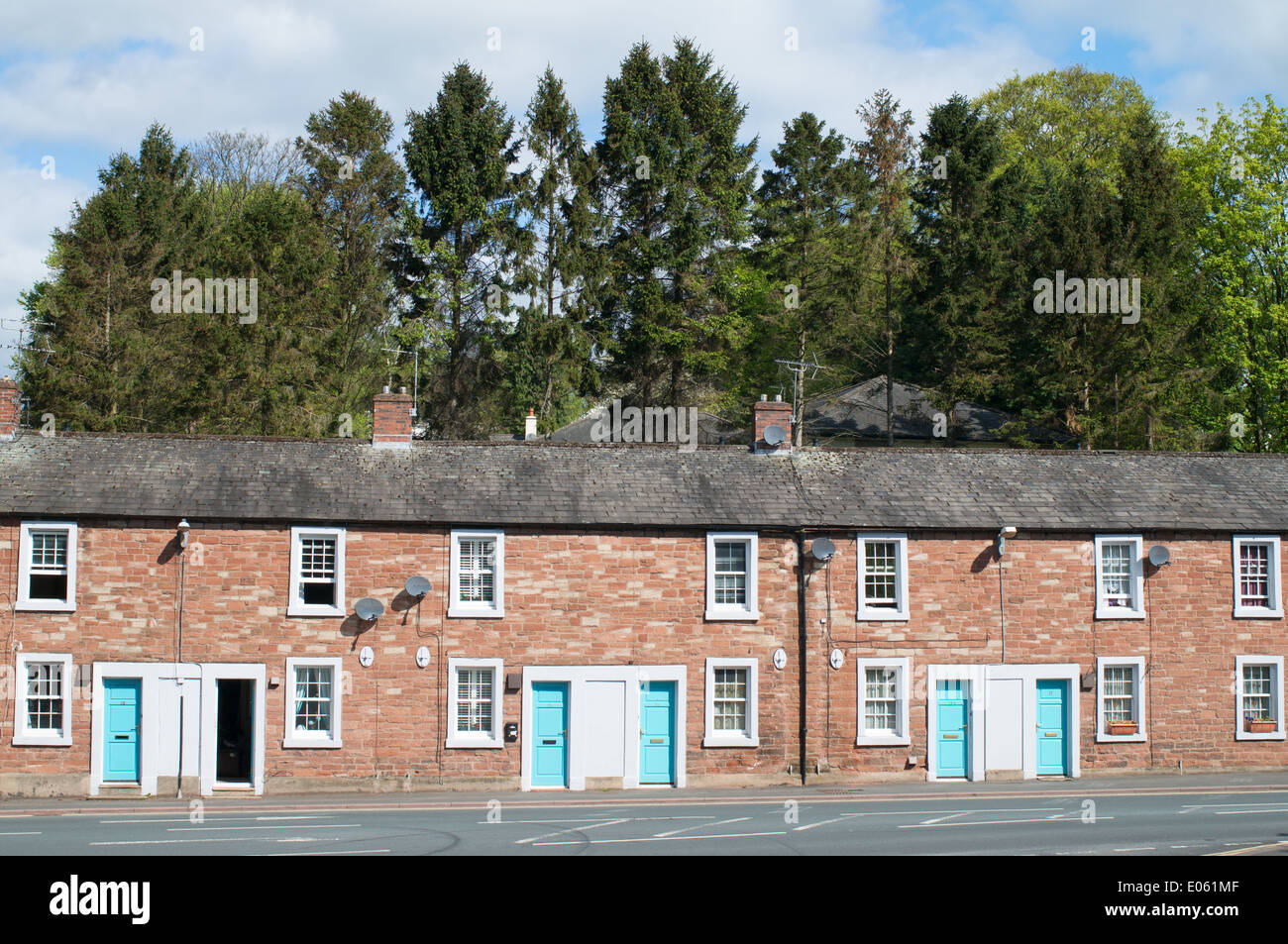 Row of red sandstone terraced houses in Brampton, north west England UK Stock Photo